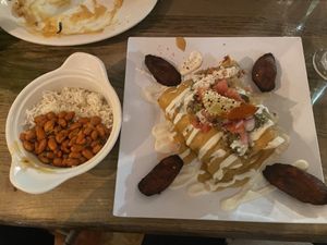 Taquitos with a side of rice and beans  at Arles and Boggs  in Wallingford