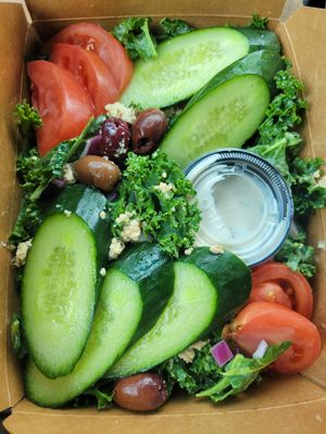 Greek kale salad with house made vegan feta and tadziki at Arles and Boggs  in Wallingford