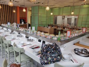 Conveyor belt and Seating. at Shuang Shuang in London