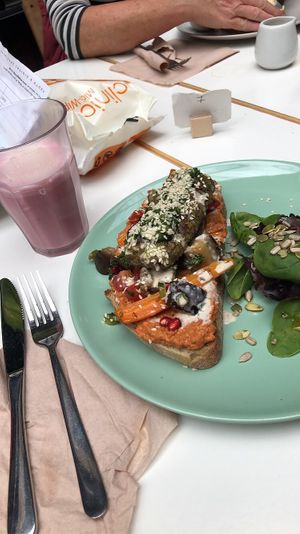 smorbrod (hummus, kofta, tahini, veg, seeds, aubergine on toast) and beetroot and orange latte at Sacred Grounds in Exeter