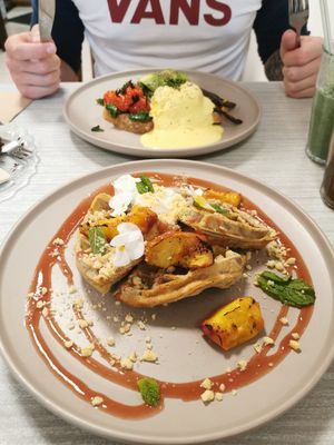 Sweet waffle with peaches at Sacred Grounds in Exeter