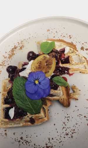   at Sacred Grounds in Exeter