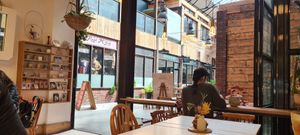  at Sacred Grounds in Exeter