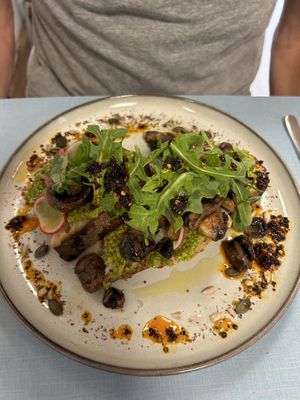   at Sacred Grounds in Exeter