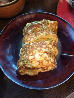 Kind of like an egg omelette with veggies and herbs at Yasai Izakaya Genki in Tokyo