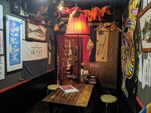 one of the dining tables, eclectic atmosphere! at Yasai Izakaya Genki in Tokyo
