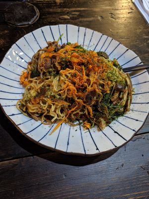 noodles with veg, herbs, and lots of mushrooms at Yasai Izakaya Genki in Tokyo