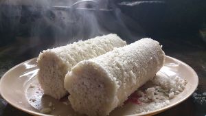 Puttu  - Puttu (Rice Cakes)

Is a very popular south Indian breakfast dish, also known as ‘steamed rice cakes’. Puttu is made of steamed cylinders of grounded rice layered with coconut. Puttu is served with side dishes such as palm sugar or chickpea curry or banana. Visit any Malayali household across the world and chances are that you’ll see delicious Puttu and Kadala (chickpea) curry served for breakfast. We offer this amazing dish that will leave an indelible mark in your taste buds that you will come back for more.
 at Vinnies in Selkirk