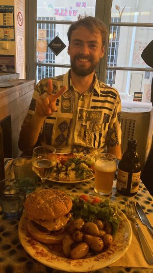 Happy guy having an enchilada   at La Cabane en Ville in Aix-en-provence
