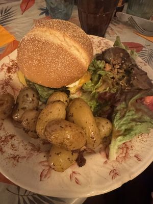 Seitan burger and potatoes. Burger was very flavorful with vegan cheese.  at La Cabane en Ville in Aix-en-provence