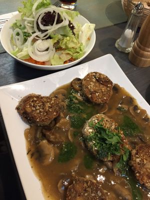 Knödel (dumplings) with mushroom gravy and side salad  at V-Bandits in Ludwigsburg