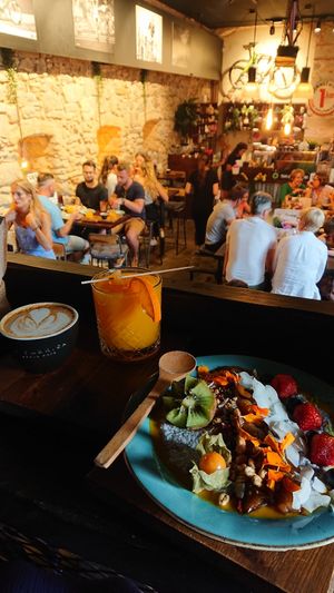Orange Ginger juice, cappuccino with almond milk and the chia sensation bowl at La Fabrica in Girona