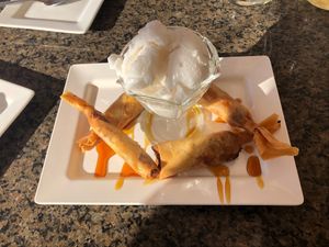  Fried banana with coconut ice cream. The toping is honey, so ask without if you want. at Yuma Thai Cuisine in Yuma