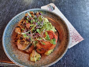 Avocado on sourdough with tomato and mushrooms at Ten O'Clock Cookie Company in Masterton