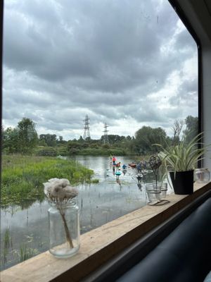 Watching the paddle-boarders 
24.05.25 at The Ark in Northampton