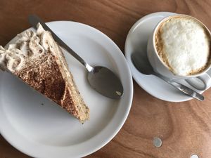 Chai spiced cake and soy cappuccino 💚 at The Ark in Northampton