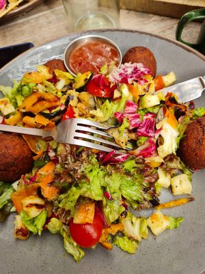 Perhaps the chef made the wrong salad, waitress wrote down vegan salad but came out with halloumi, waitress apologised and took money off at The Garden in Chippenham