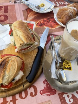 Baguette mit veganem Mortadella und veganes Schokocroissant  at Café Maria Theresia in Merano