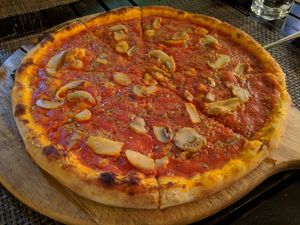 Pizza marinara with added mushrooms at Pomodoro in Vientiane