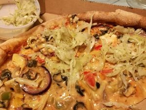 Pizza Vegana with sallad at Söderkulla Pizzeria in Malmo