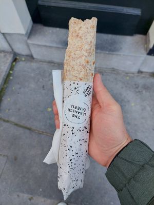 Size of a wrap (average male hand for scale) at The Lebanese Sajeria in Amsterdam