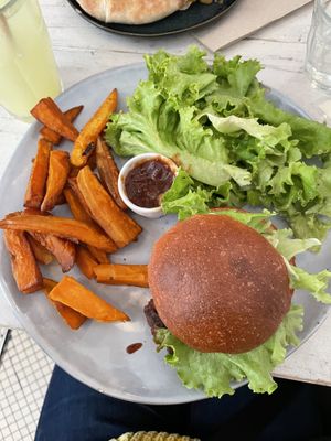 Smash Pink Burger with fries  at Maison Nomade in Paris