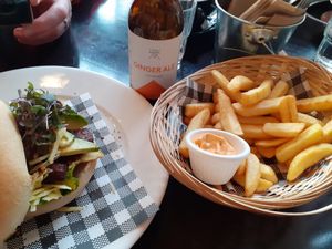 Breakfast bagel with side of chips and vegan chipotle aioli at Willi's Kitchen in Wellington