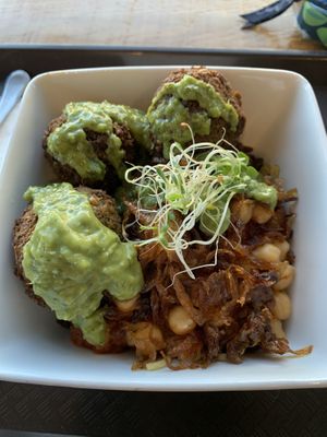 Regular bowl with falafel and avocado sauce at Koshary Corner in Clarksville