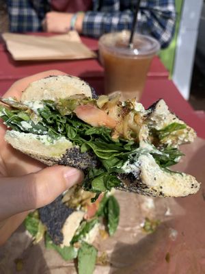 Poppy bagel w/ plain veg cream cheese, spinach, tomato, & grilled brussel sprouts  at Willow's Bagels in Burlington