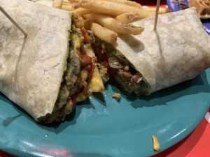 The bomb wrap. In the menu, it said beyond burger, but it was definitely not the texture or smell of the beyond burger, so I asked and it was the impossible burger! It was good  at The Friendly Toast in Burlington