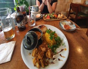 Indian dish and vegan cheese fondue at Gusto-040 in Eindhoven