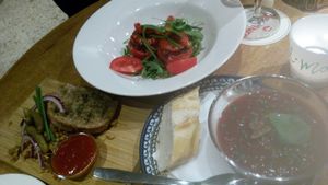 Vegan tapas - stuffed tomatoes, pulled jackfruit sandwich and tomato and fig soup at Gusto-040 in Eindhoven