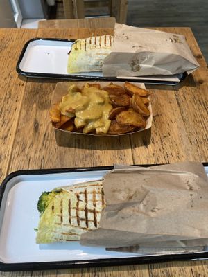 Two wraps with potatoe wedges with peanut hummus   at Gustav Grün - Wilhelmstraße in Muenster