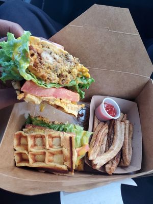 Chicken and waffle sandwich with waffle fries. at Beyond Vegan Cell Food in Portsmouth