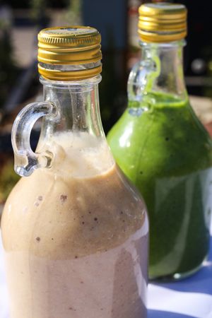Smoothies to fill your hunger and nourish your body. Both made with house made coconut/cashew milk and frozen bananas. Green Smoothie: spinach, cilantro, celery, and cucumber. Breakfast Smoothie: oats, orange, apple, dates, and cinnamon. at The Peaceful Palate in Eugene
