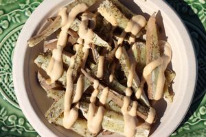 Baked sweet potato fries with cashew cheese. at The Peaceful Palate in Eugene