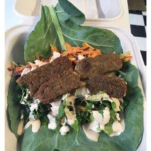 Collar wrap with soy free tempeh, mixed greens, rainbow carrots, cucumber and cashew cheese. at The Peaceful Palate in Eugene