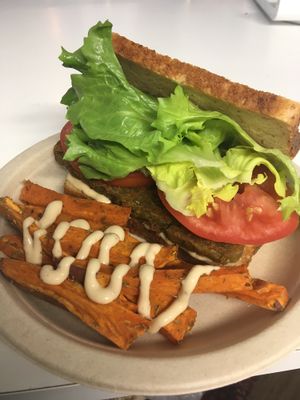 Soy free tempeh BLT with sweet potato fries topped with cashew cheese.  at The Peaceful Palate in Eugene