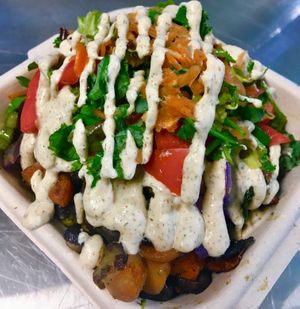 Beta bowl with rice and chickpeas, fresh veggies and topping and cashew ranch sauce.  at The Peaceful Palate in Eugene