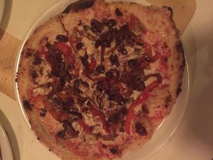 Pizza with vegan cheese, olives, roasted red peppers, black olives, sautéed onions and mushrooms....delicious! at Brigade Pizzeria in Montreal