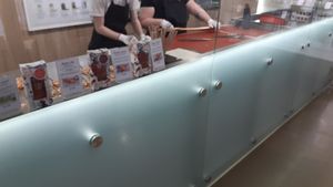 Ladies making the sweets at Zuckerlwerkstatt in Vienna