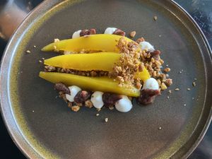 Pear in orange syrup with feta creme  at Bonboon in Amsterdam