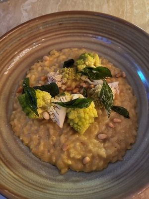 Main

Risotto with smoked romanesco puree and curry – romanesco confit –
pickled romanesco – pine nuts – crispy curry leaves. at Bonboon in Amsterdam