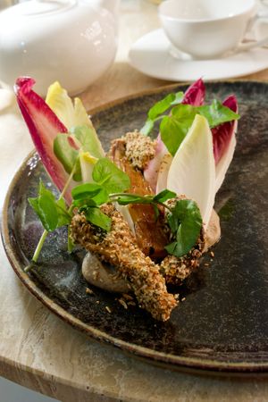 Intermediate: Fried oyster mushroom w/chicory cooked in Marmite butter at Bonboon in Amsterdam