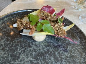 2nd course with chicory and oyster mushrooms (fried and as a mousse). This was our favourite course. Especially the fried oyster mushroom with sesame and nori was amazing. at Bonboon in Amsterdam