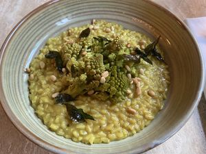 Risotto with romanesco and curry spices: tasty and creamy with a nice Indian edge. This was our 2nd favourite course. at Bonboon in Amsterdam