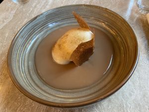 Dessert with polenta cake, foam and cinnamon tuiles. Quite good. at Bonboon in Amsterdam