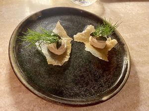 Amuse with sesame mousse and dille on filo dough  at Bonboon in Amsterdam