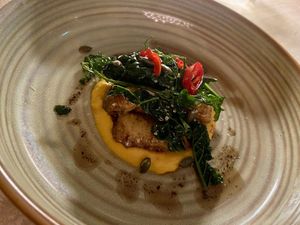 Main course: pumpkin gnocchi with garlic and black cabbage. Small portion, but great taste. Our favourite of the menu. at Bonboon in Amsterdam