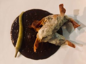 Delicious starter with black lentil and chocolate sauce at Bonboon in Amsterdam